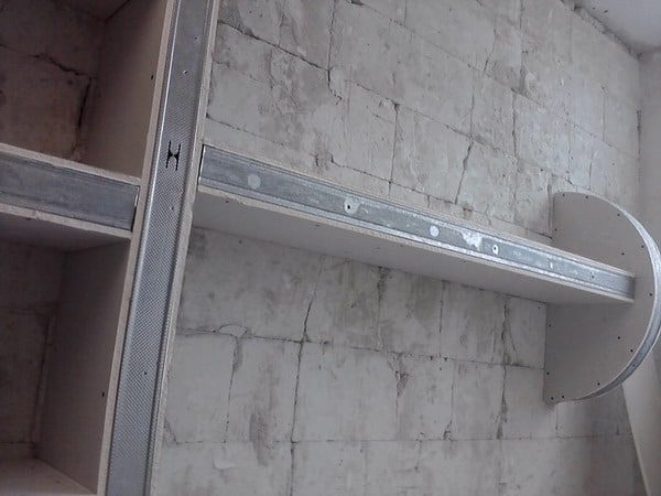 Shelves in drywall bathroom