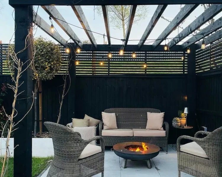 Make the terrace equipped with a pergola cozy for autumn and winter and add a fireplace