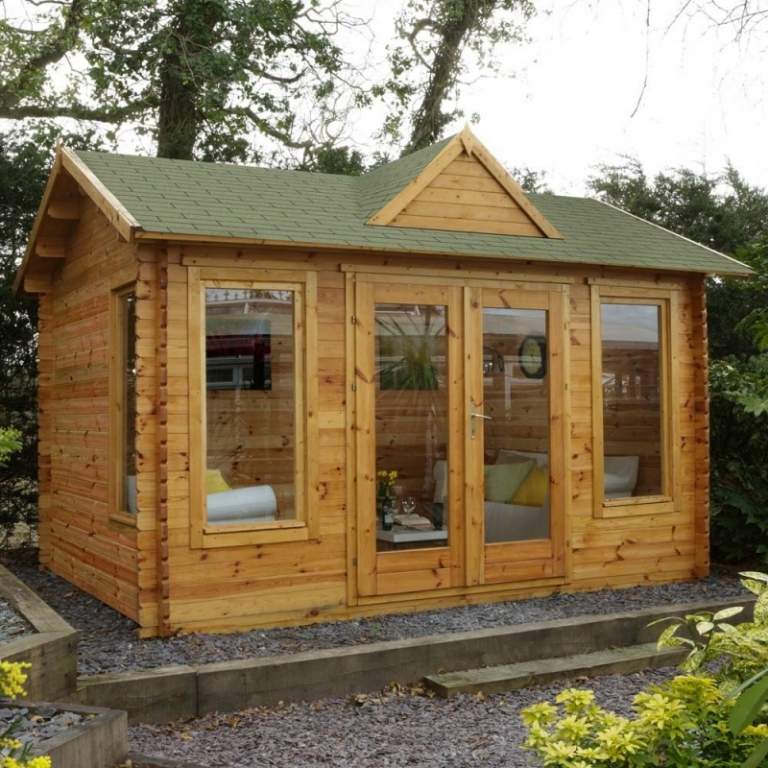 Log cabin in the garden window armchair