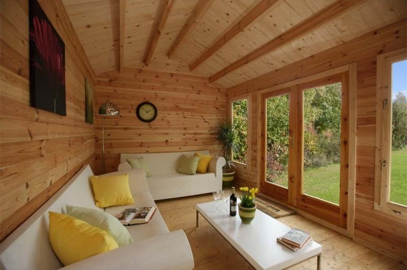 Log cabin garden ideas wooden sofa