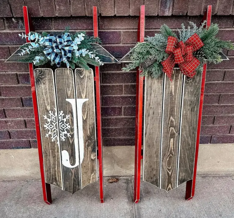 Decoration with sleighs and arrangements for winter or Christmas and lettering or letters